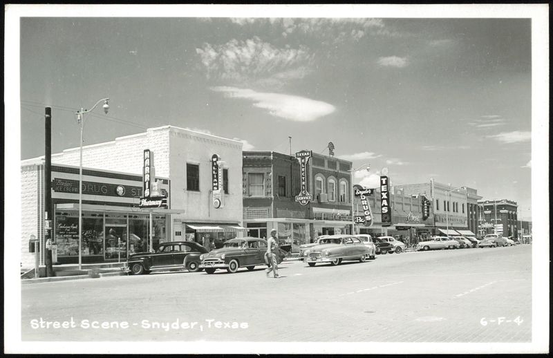 Main Street with Businesses and Cars Snyder Texas