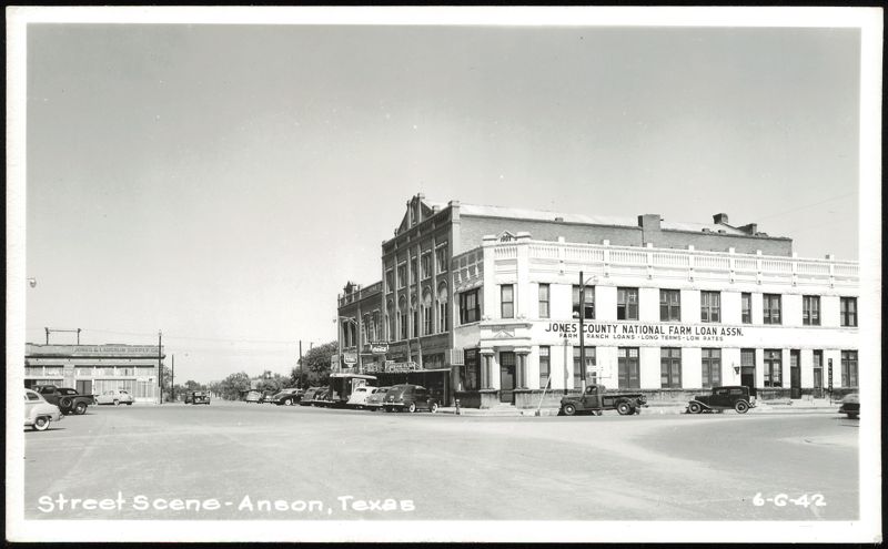 Main Street with Jones County National Farm Loan Assn. and Jones & Laughlin Supply Co. Anson Texas