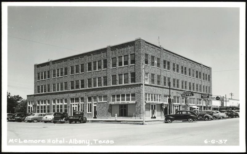 McLemore Hotel and Street Scene with Cars Albany Texas