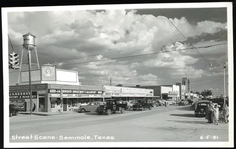 Street Scene with Jameson's Grocery, Tower Theater, and Seminole Water Tower Texas