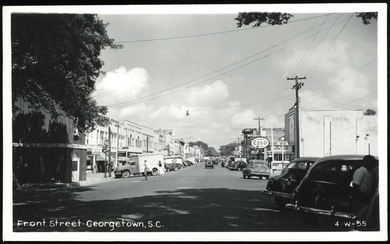 Front Street with cars and businesses, Georgetown South Carolina