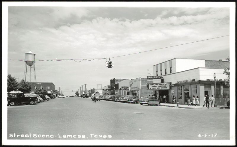 Street Scene with Majestic Theater, Taylor Wright Drug, and Water Tower Lamesa Texas