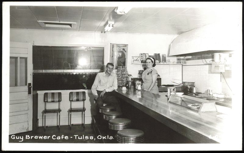 Guy Brewer Cafe interior with man at counter and woman behind counter Tulsa Oklahoma