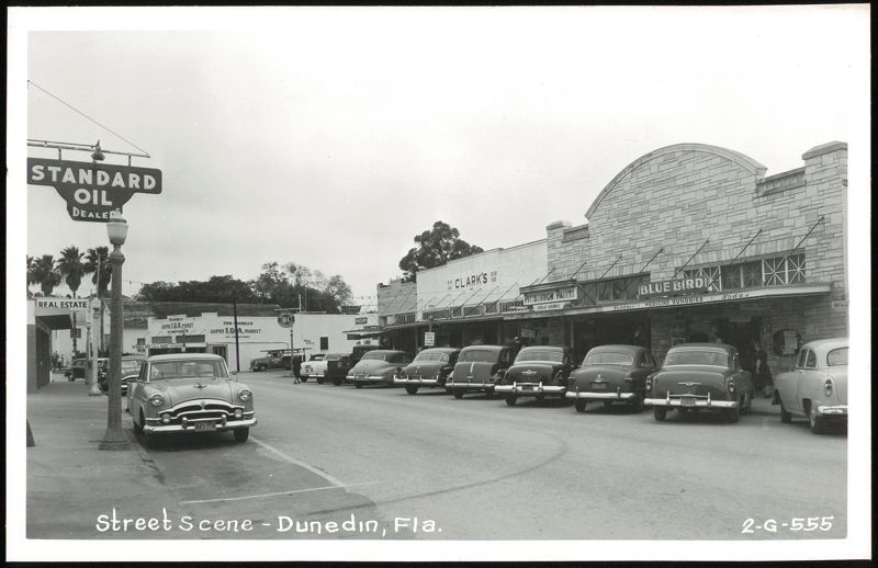 Street Scene with Standard Oil, Clark's, Blue Bird, and Parked Cars Dunedin Florida