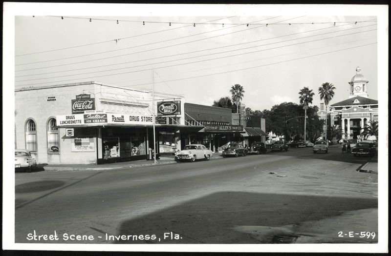 Downtown Street Scene with Rexall Drug Store, Cafe Louie's, and Courthouse Inverness Florida