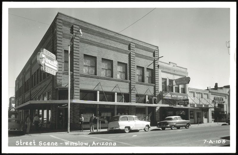 Street Scene with Rexall Drugs, Palace Hotel, and Western Auto Supply Winslow Arizona