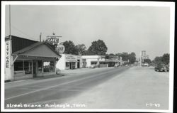 Street Scene featuring City Cafe, Gulf Station, and Monteagle Hotel Postcard