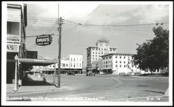North Square Scene with Recknagel Drugs and Hotel Marshall Postcard