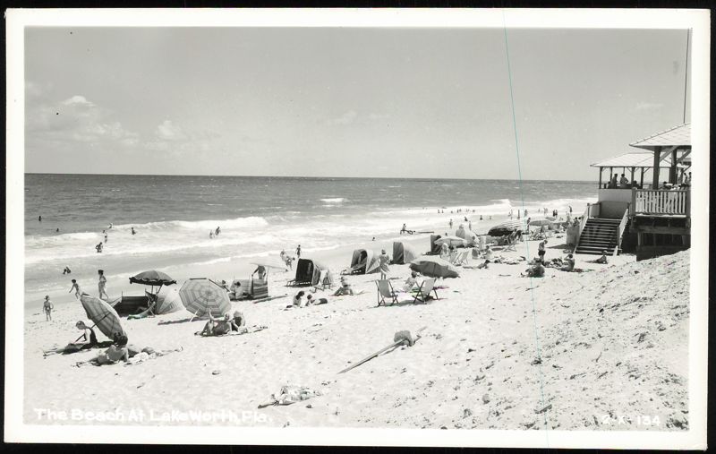 Beach Scene with Umbrellas and Bathers Lake Worth Florida