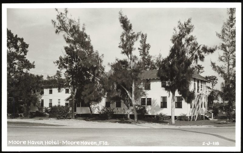 Moore Haven Hotel with Tall Trees and External Staircase Florida