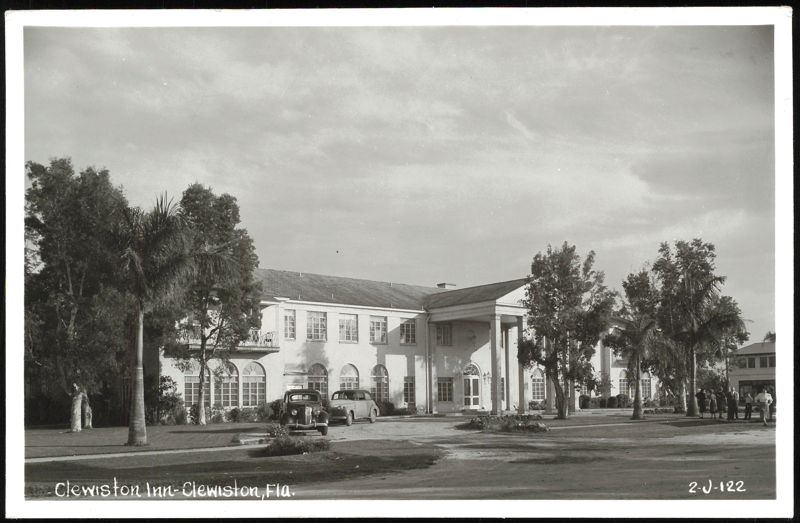 Clewiston Inn with Vintage Cars and Palm Trees Florida