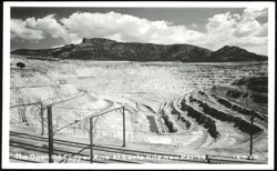 Open Pit Copper Mine with Railway Tracks and Mountains Postcard
