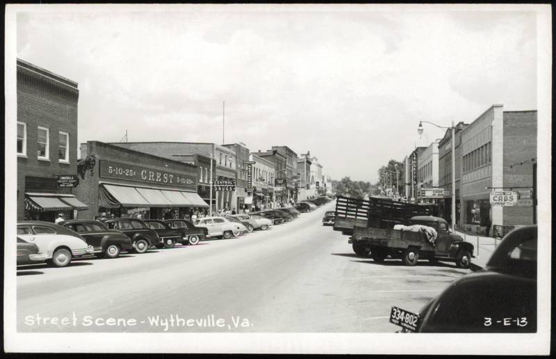 Street Scene with Crest Store and Classic Cars