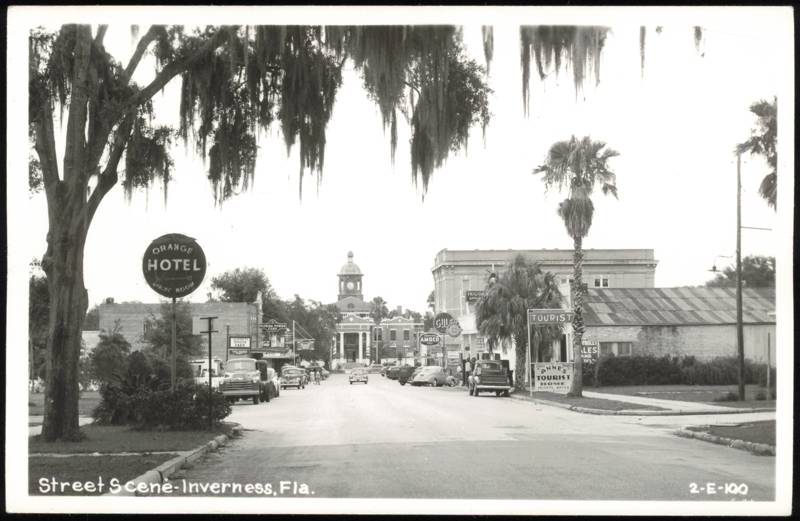 Street Scene with Courthouse and Orange Hotel Sign