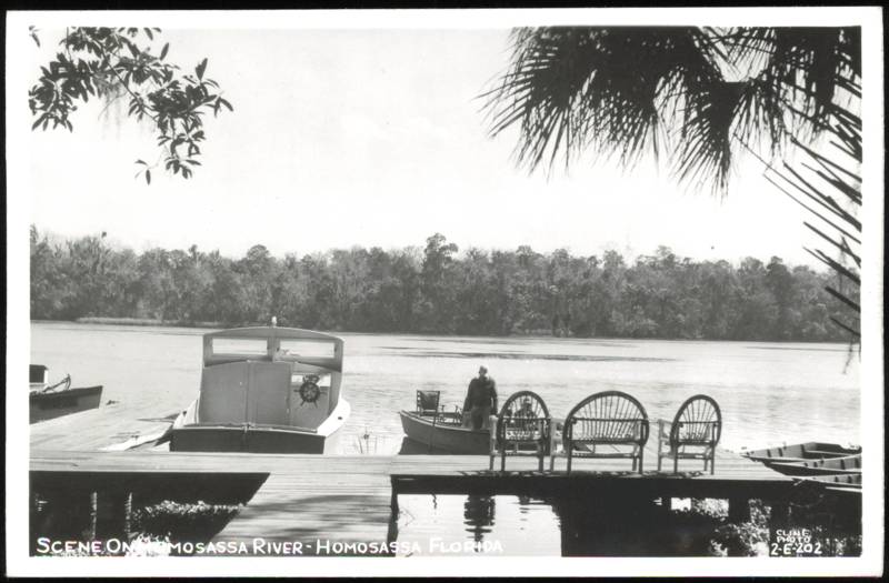 Boats and Chairs on Dock Along the Homosassa River Florida