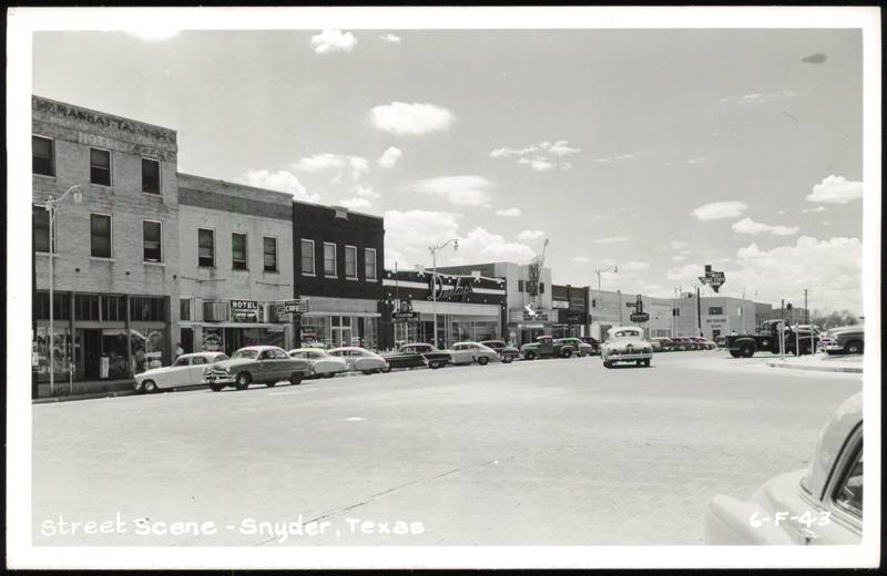 Downtown Street Scene with Dunlap's Storefronts & Cars