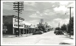 Street Scene with New Arcadia Drug Store Postcard