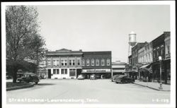 Street Scene with First National Bank and Sterling Stores Postcard