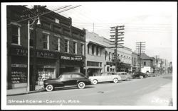 Street Scene with The Leader and Perkins Drugs Postcard