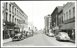 Street Scene with Davis Grill and Woolworth Co. Postcard