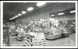 Interior View of Moore Drugs Store Postcard