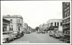 Street Scene with Cars and Businesses in Fitzgerald Postcard