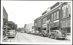 Ocoee Street Scene with Businesses and Parked Cars Postcard