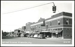 Street Scene with Hotel Franklin and Arnold Drug Co. Postcard