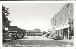 Street Scene with Gay Hotel & Patterson's Pharmacy Postcard