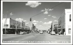 Second Street Looking East with Shops and Cars Postcard