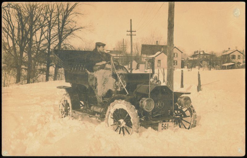 Man in Reo Automobile Stuck in Deep Snow