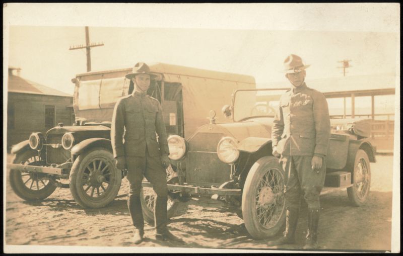 Soldiers in Uniform Standing by Early Automobiles World War I