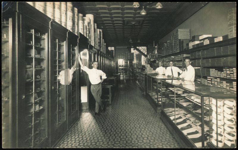 Men's Clothing Store Interior with Sales Clerks Business & Company Photos