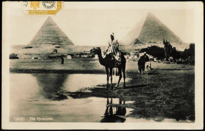 The Pyramids of Giza with Camel Rider Cairo Egypt Africa