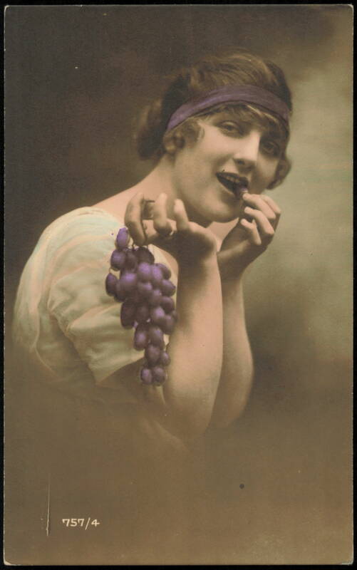 Woman Wearing Purple Headband Eating Grapes France