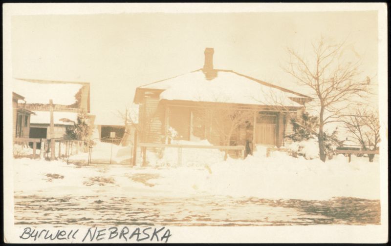 Snow-Covered House in Winter
