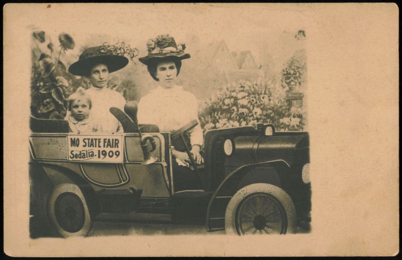 Two Women and Child in Car, MO State Fair Sedalia 1909 Missouri