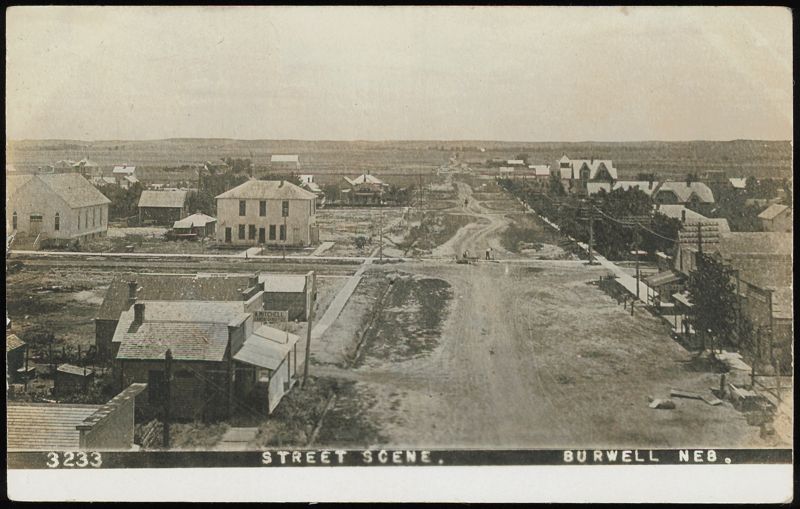 Street Scene with A. Mitchell Land Office