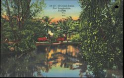 Canal Scene with Tropical Foliage and Flowers Postcard