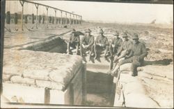 Soldiers in Training Trenches with Bayonet Dummies Postcard