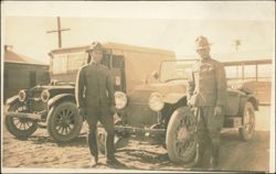 Soldiers in Uniform Standing by Early Automobiles Postcard