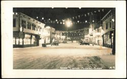Second and Cushman Street Scene at Night Postcard