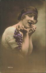 Woman Wearing Purple Headband Eating Grapes Postcard