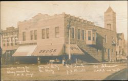 Pennell Building Opening, Miller Drug Co. and Olney Music Co. Postcard