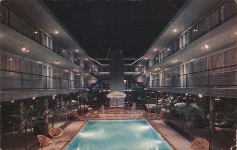 The deVille Motor Hotel - Pool & Courtyard at Night New Orleans Louisiana