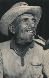 Seldom Seen Slim Prospector Smoking Pipe, Straw Hat Postcard