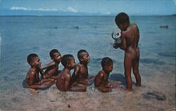 Fijian Children at Play in Shallow Ocean Water Postcard