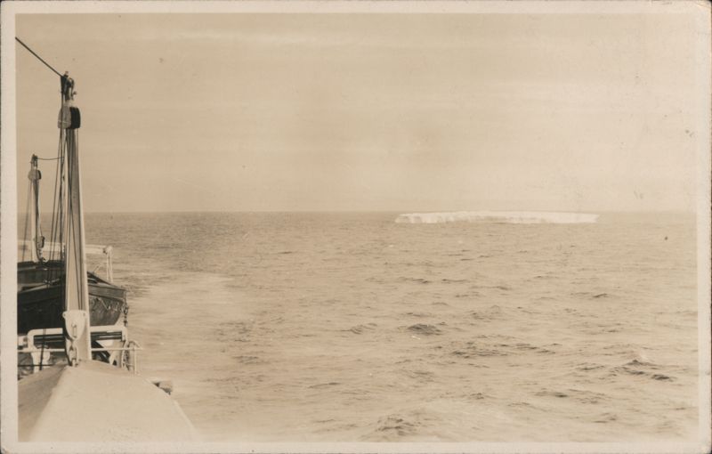 Ship at Sea with Iceberg in Distance Transportation