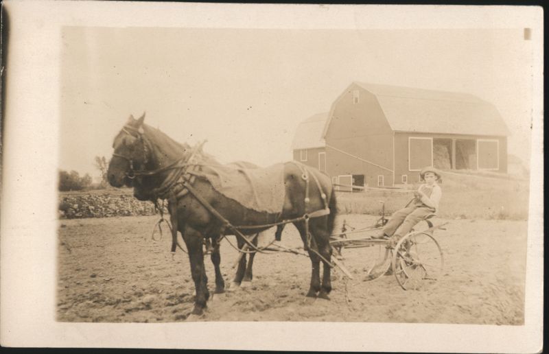 Boy on Cart with Two Horses & Red Barns Farming