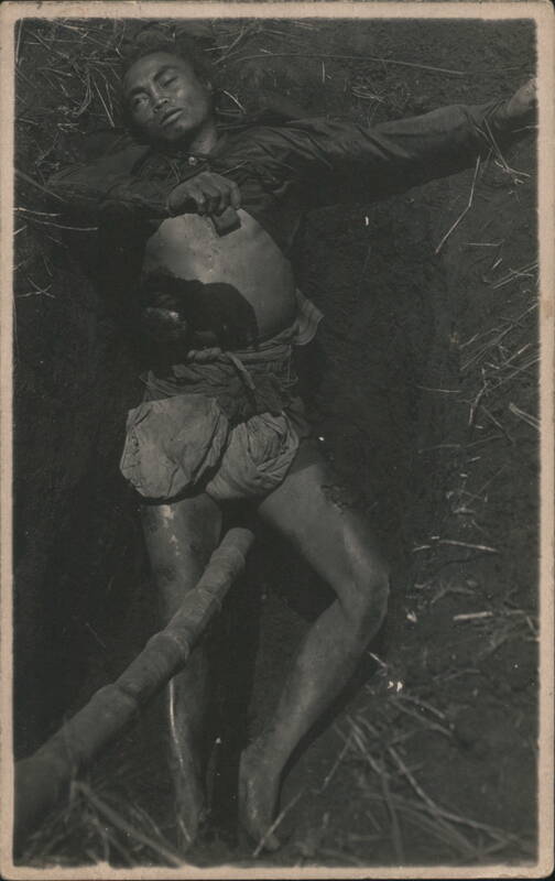 Dead Man with Abdominal Wound Lying on Ground Philippines